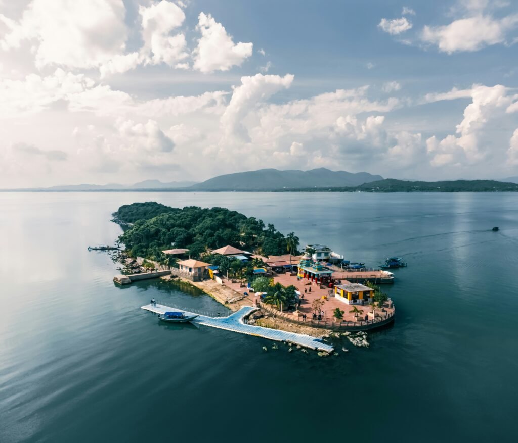 Where to Stay in Odisha, Best Areas and Stays 3 Aerial view of a small temple island on Chilika Lake near Satapada, Odisha