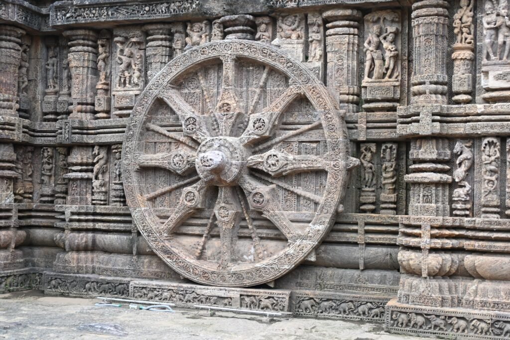 Carved stone wheel on the Konark Sun Temple facade