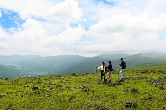 Panoramic view of forested valleys and hills from Deomali peak in Koraput