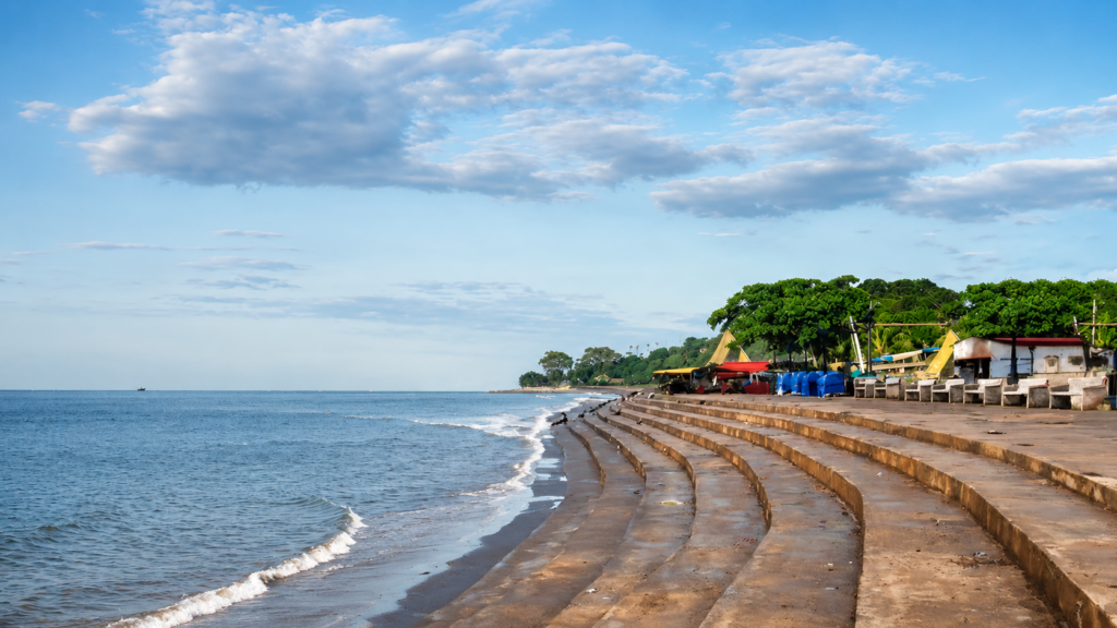 Empty seaside steps along the quiet coastline at Gopalpur-on-Sea