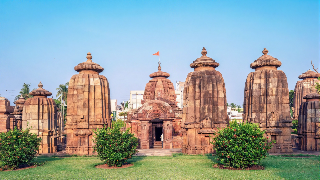 Cluster of carved temple spires and a shrine entrance in Bhubaneswar's old town | Things to Do in Bhubaneswar