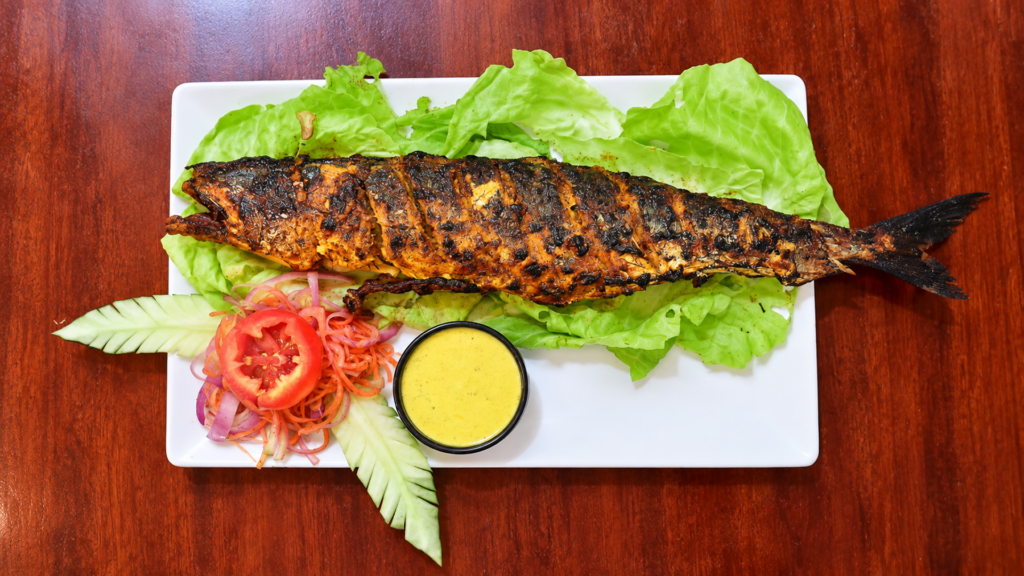 Grilled fish served at a Gopalpur seafood restaurant