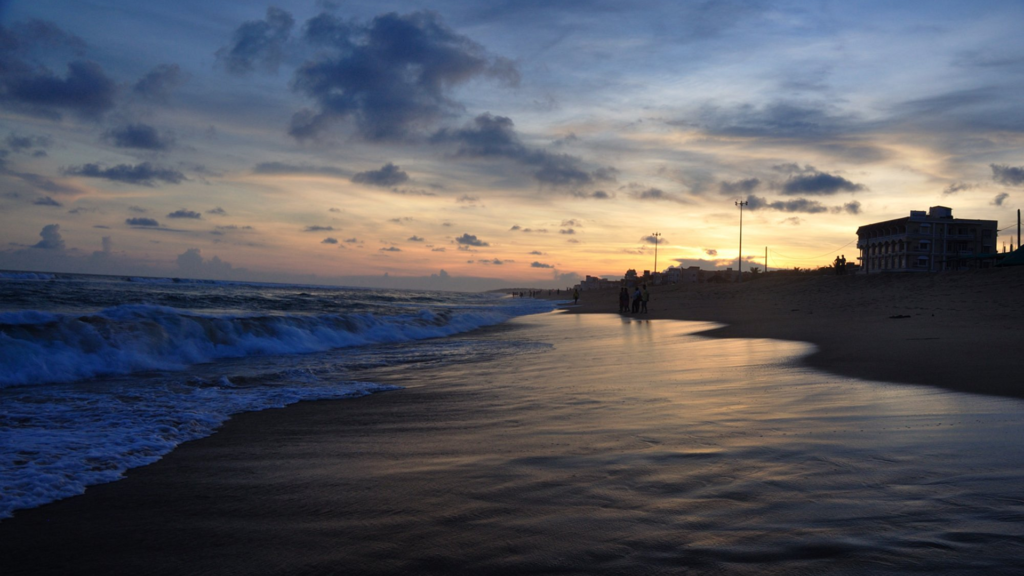 Waves rolling onto Puri beach at sunset, worth an evening on a trip to Bhubaneswar and the Odisha coast