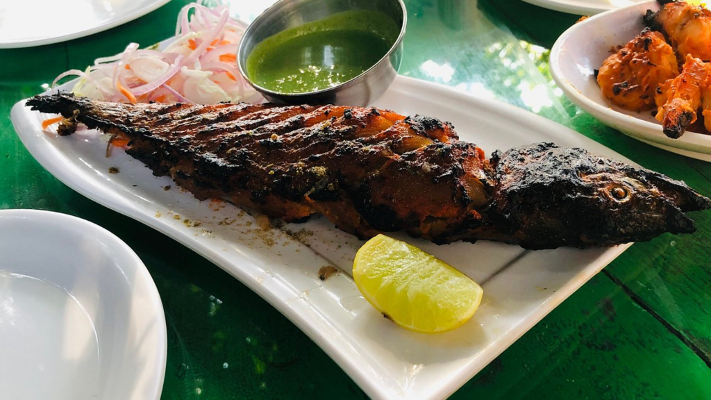 Tandoori grilled fish and prawns at a seafood restaurant in Puri