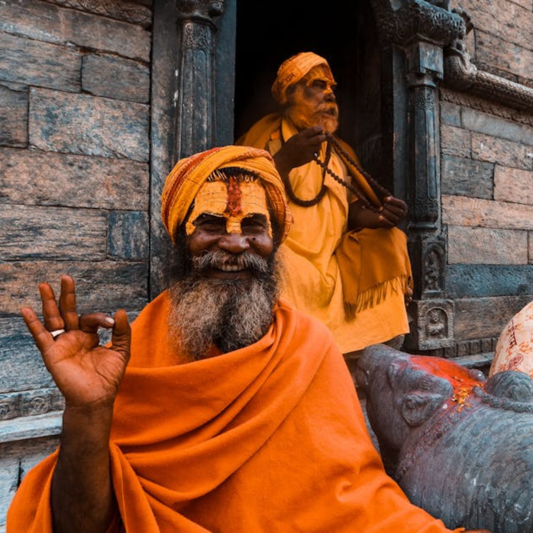 Two monks in traditional attire.