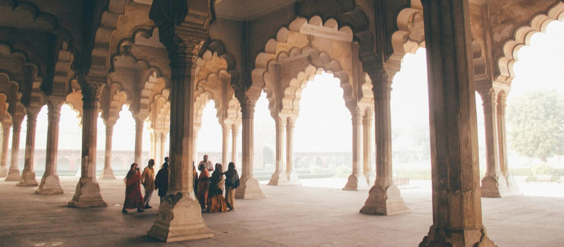 Personalised Tour Packages in India By Immersive Trips 1 Personalized Travel in India - An interior view of a pillared hall within the Agra Fort in Agra, India | Immersive Trips
