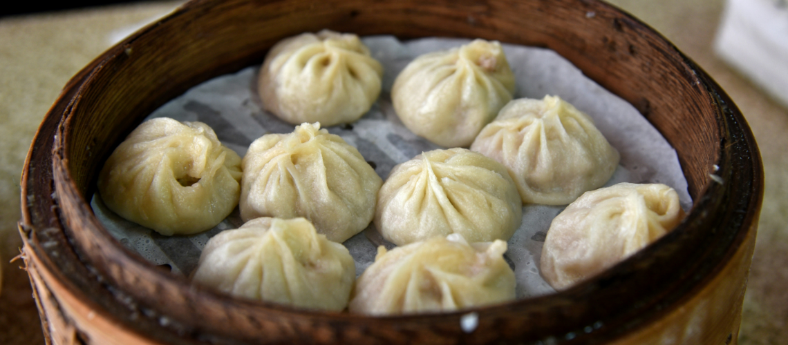 Steamed Tibetan momos served in a traditional bamboo basket | Best Places to Eat in Dharamshala
