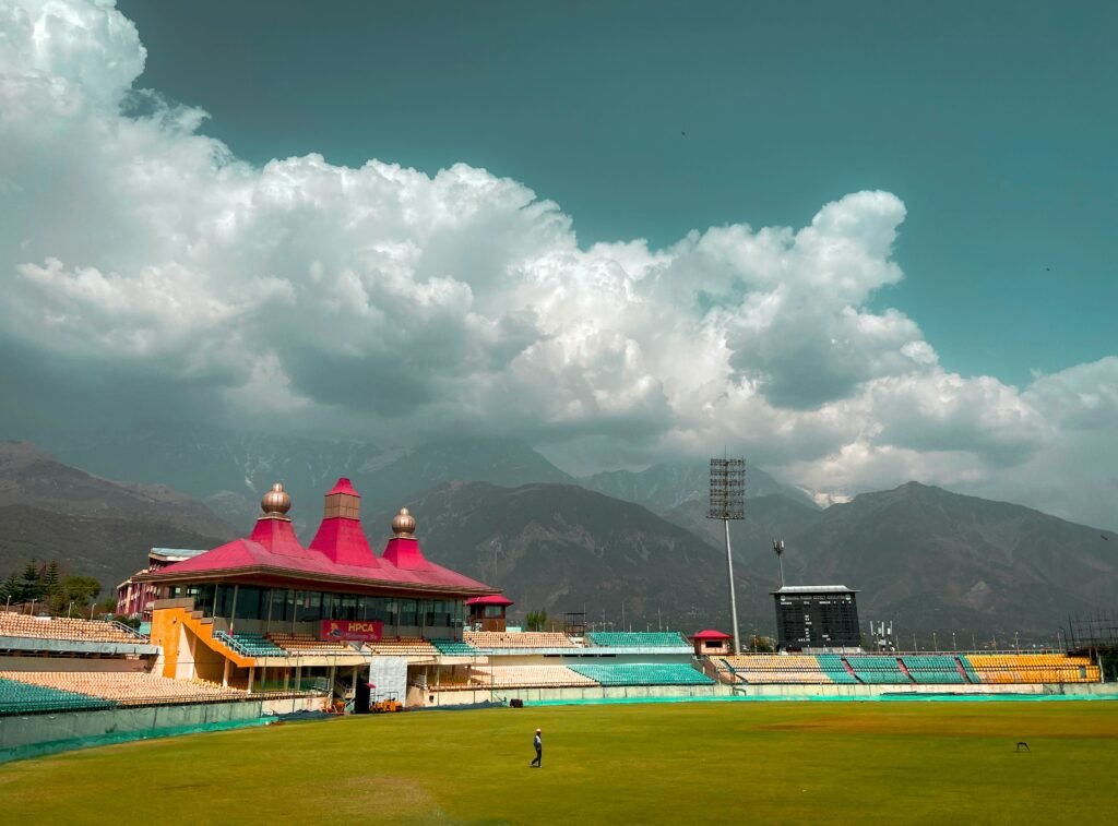 Best Things to Do in Dharamshala: A Complete Guide 2 Things to do in Dharamshala - A Tibetan monastery in Dharamshala with the Dhauladhar mountains in the background