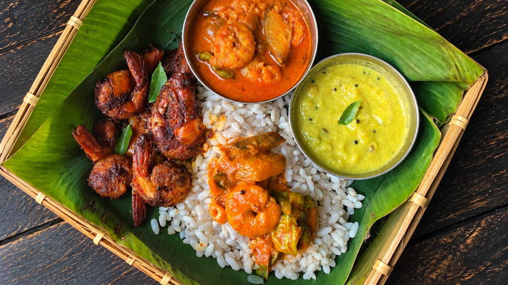 Seafood platter with prawn curry and rice, among the best places to eat in Gopalpur