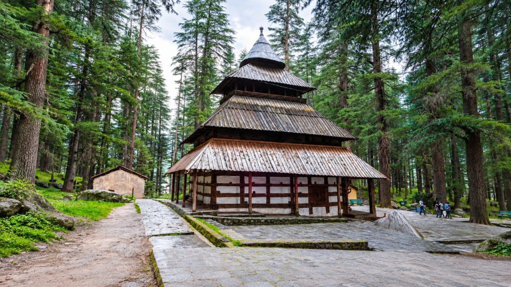 Shimla Manali Family Tour Package, a Himalayan Trip for Every Generation 2 Wooden pagoda-style Hidimba Temple surrounded by tall cedar trees in Manali